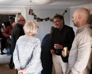 Alan laughing as he talks to Bosse and Marie-Anne as LenaFest gets going