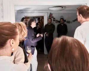 Alan's speech with everyone looking on.