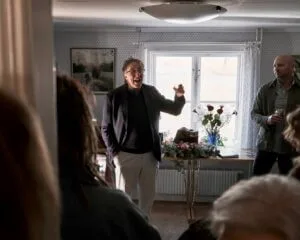 Alan proposes a toast — to Lena, love and life — at the end of his speech