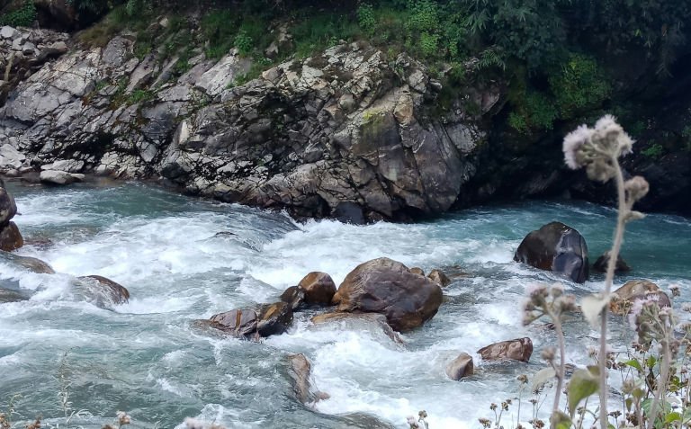 Rocks in a fast-flowing mountain stream